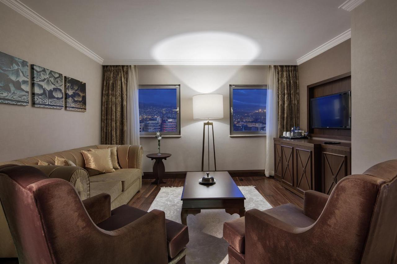 Wyndham Grand Кайсери Номер фото A living room at the hotel